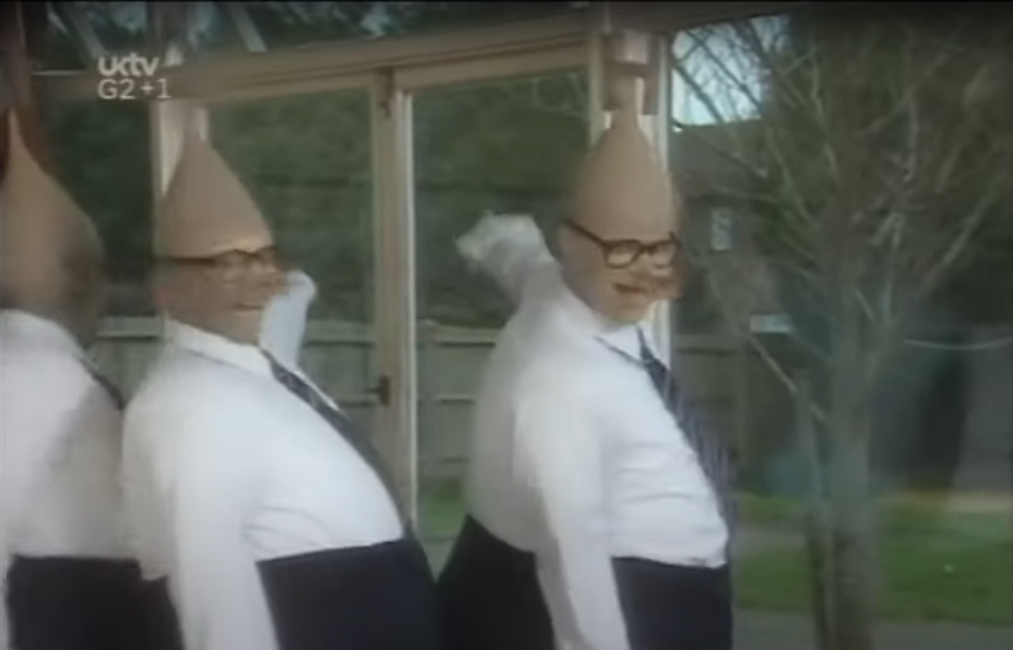 Aliens Image from a sketch "English for Aliens" of aliens pointing at a tree.